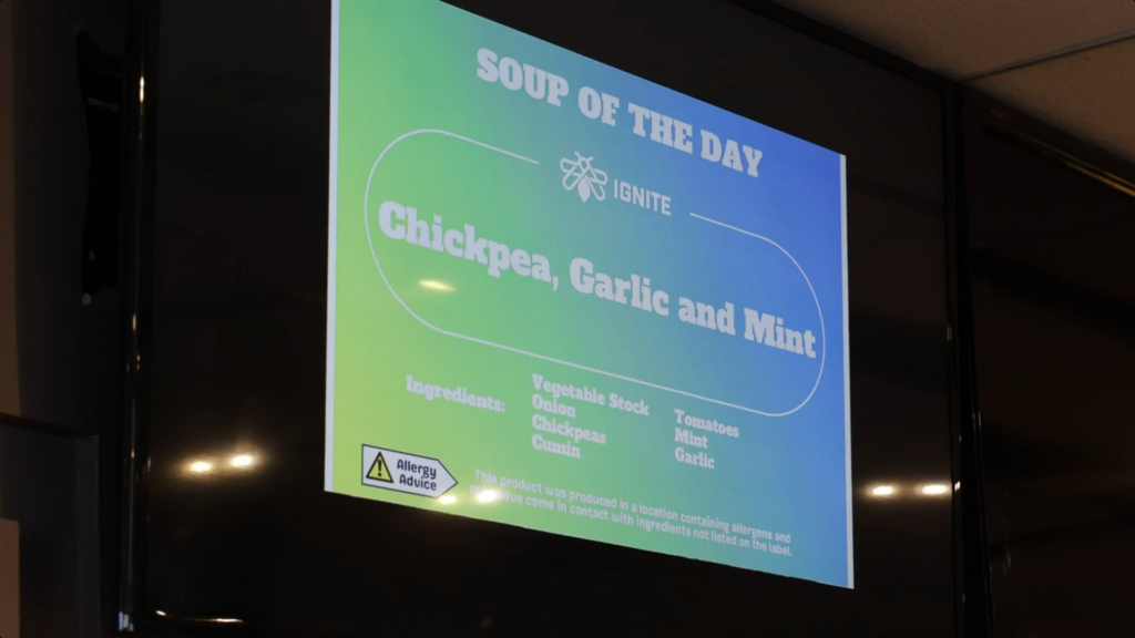 a billboard that shows soup of the day