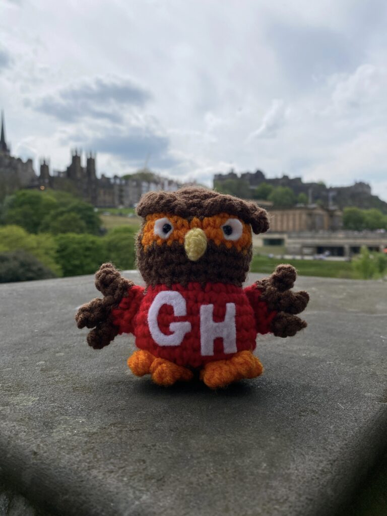 Picture of Swoop the Great Horned Owl, the mascot of the University of Guelph-Humber, in Edinburgh, Scotland during an exchange program.
