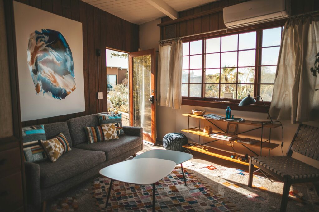 Picture of a house with its windows allowing natural light in relating to sustainability.