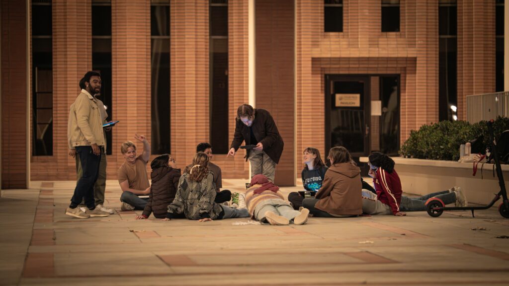 Group of students hanging out on campus.