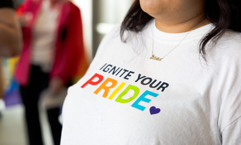 A close-up picture of the IGNITE Your Pride t-shirt.