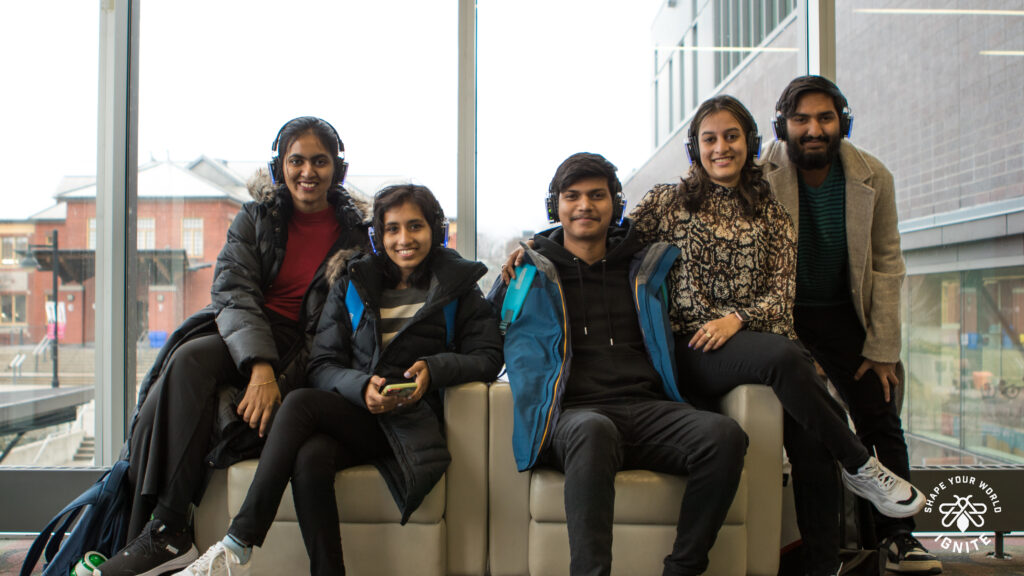 Group of students using headphones.