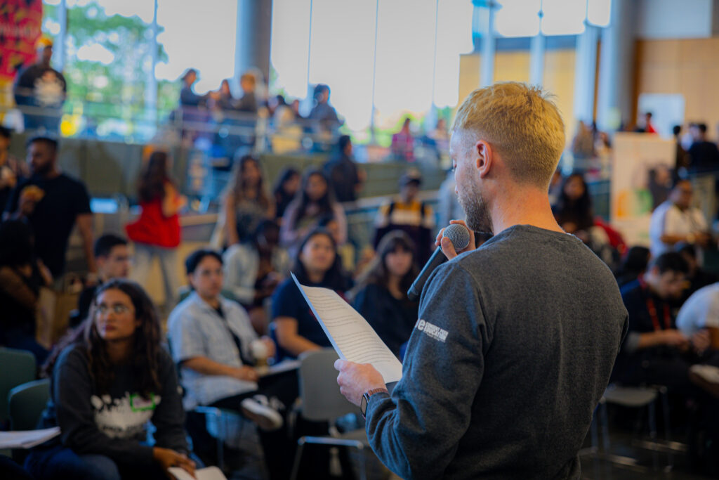 Dr. Sterling Crowe speaking to students in support of Take Back the Night and promoting safety on campus