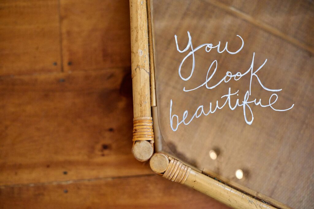 'You Look Beautiful' text in a mirror