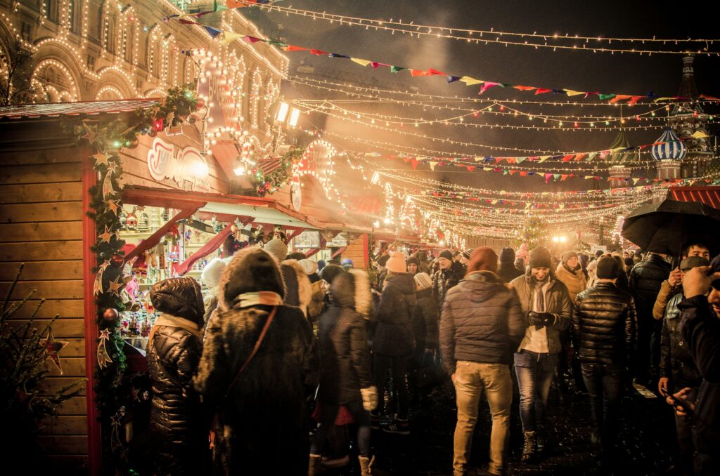 A big crowd enjoying in a Christmas fair. 