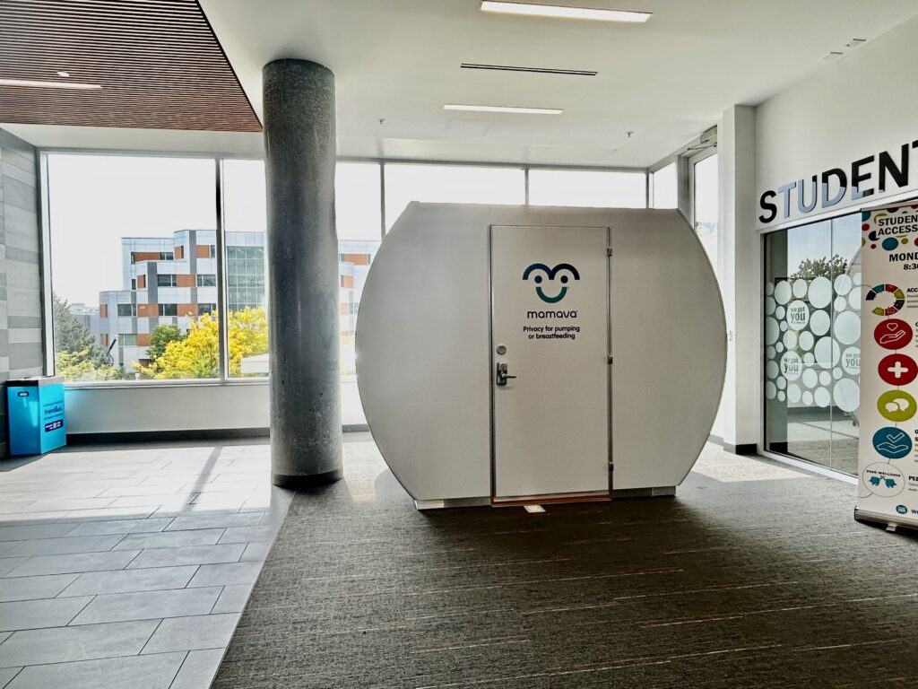 A XL Mamava Lactation pod is stationed near a wide window at Humber Polytechnic-North Campus.