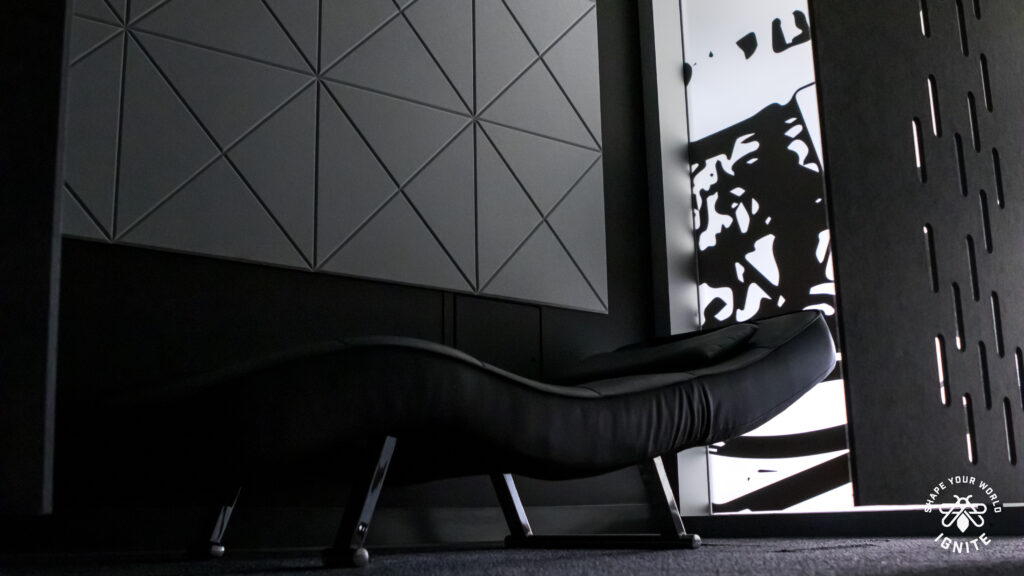 A black empty lounge bed from IGNITE's Sleep Lounge.