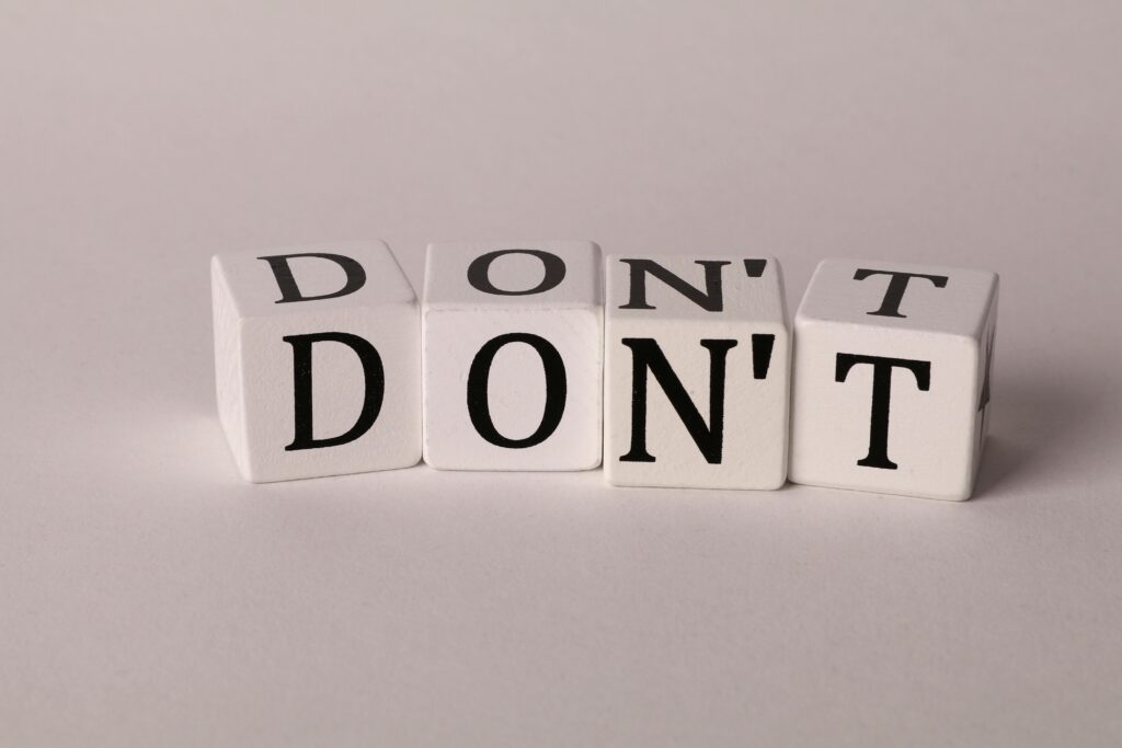 Letters on dice that form the word "Don't."