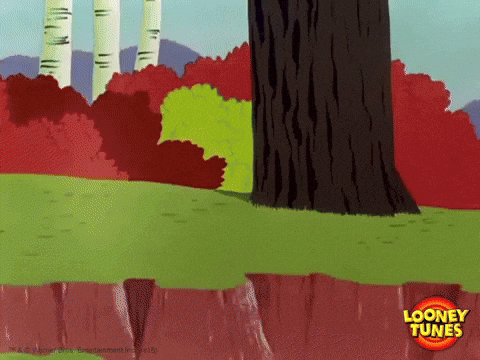 Bugs Bunny running away with luggage through the forest and into a bunker. 