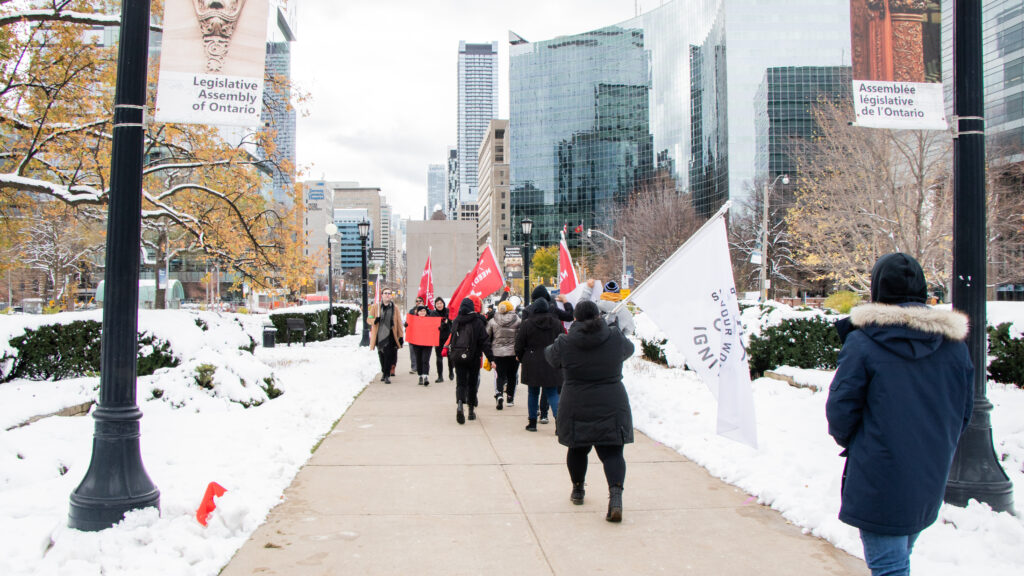 IGNITE representatives marching outside of the Assembly of Ontario