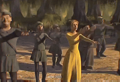 A scene from Shrek. The merry men and a women in a yellow dress dance the Macarena 