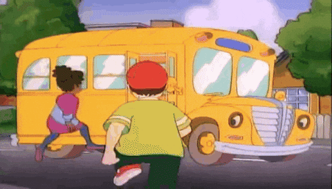 The magic school bus loading up children and gearing up ready to go. 