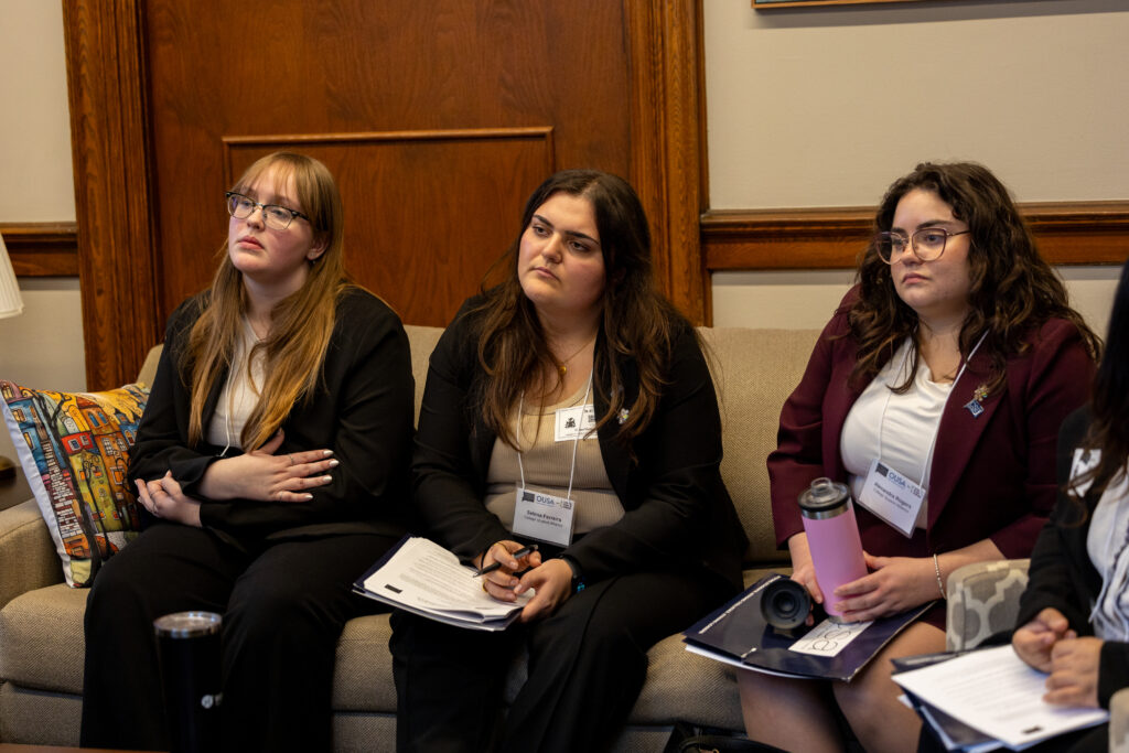 IGNITE Student Advocates Emily Edwards and Selena Ferreira and IGNITE Board of Directors Chair Alexandra Rodgers talking at Queen’s Park.