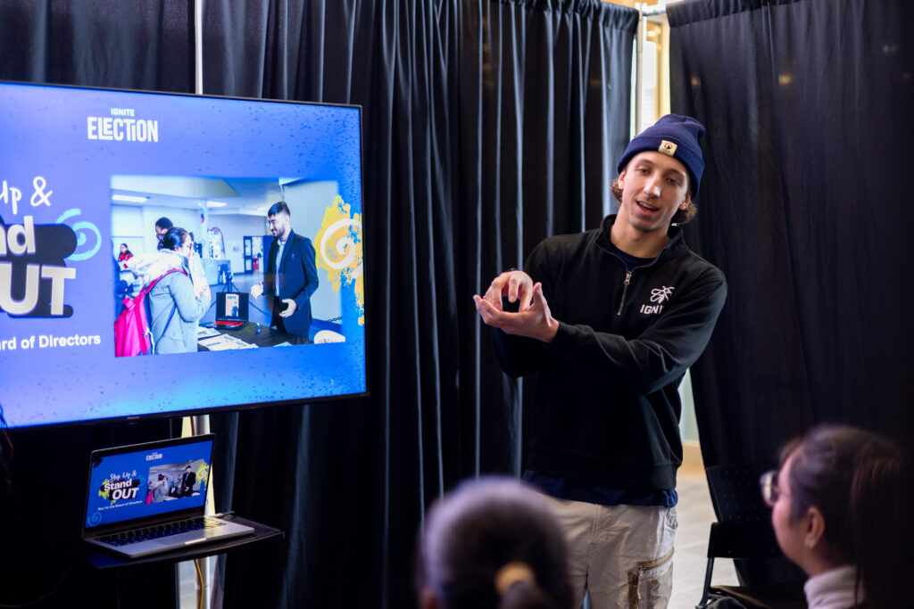 an IGNITE employee giving a presentation about IGNITE elections.
