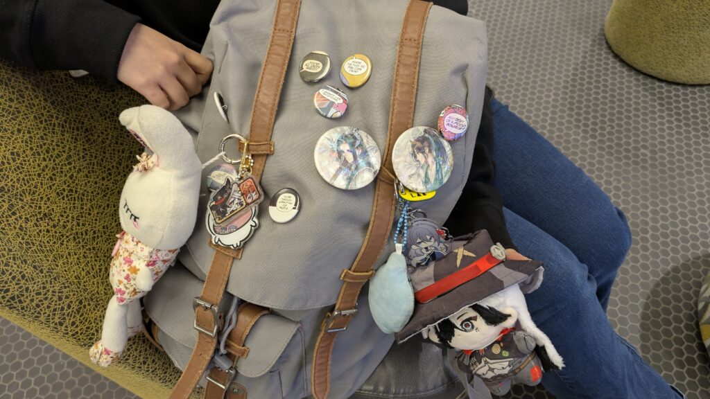 Lilian Nguyen's backpack with her expressive buttons and plushies.