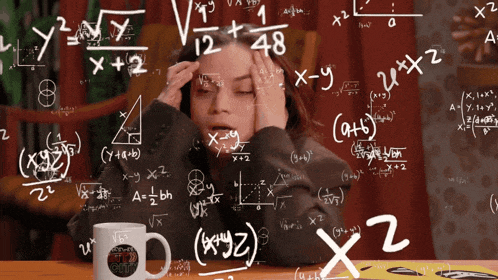 a woman sits at a table with a mug and math equations flying all around her.