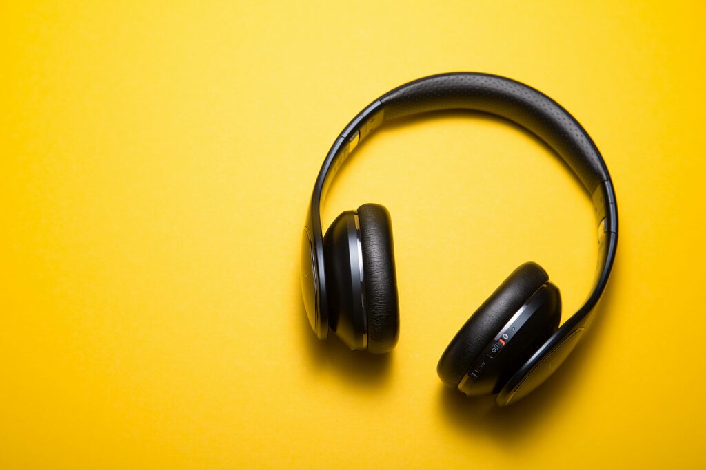 headphones with bright yellow background