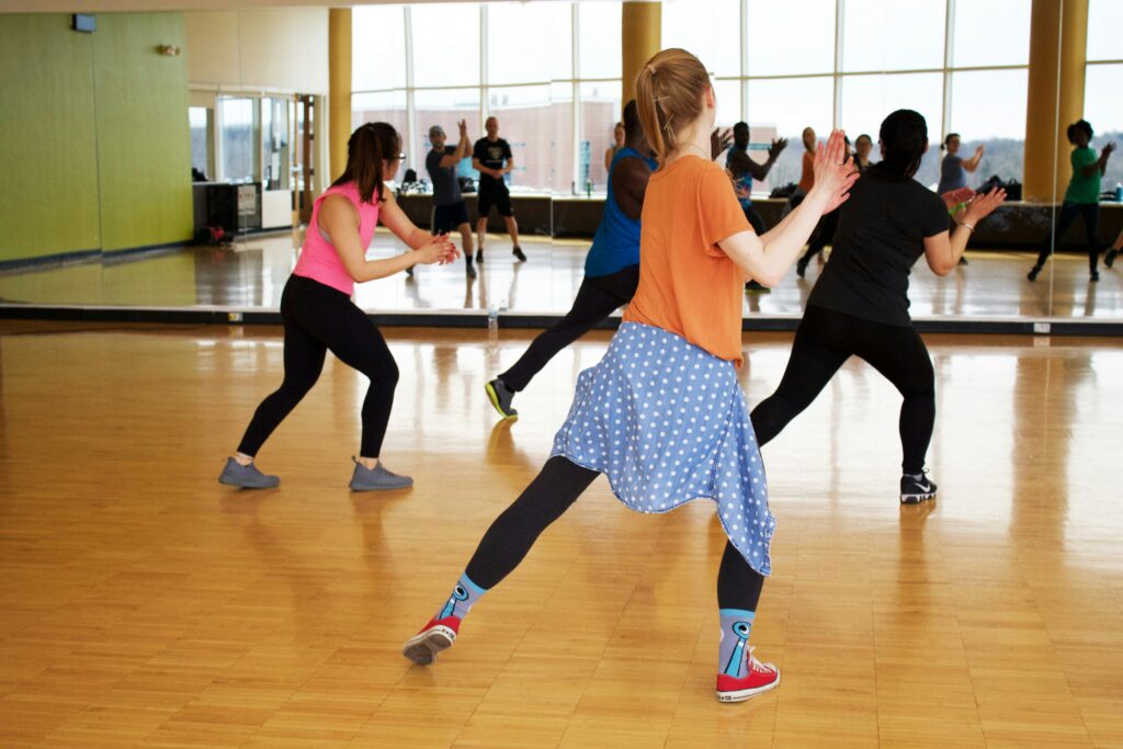 A dance class with the dancers back facing the camera
