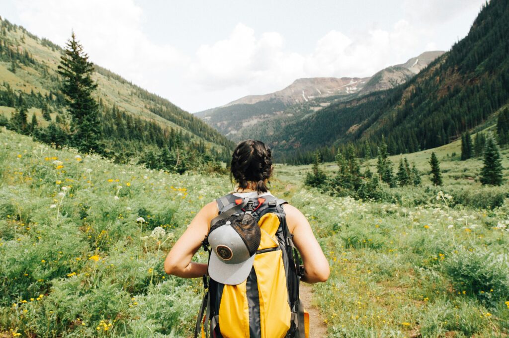 A woman going on a solo hike