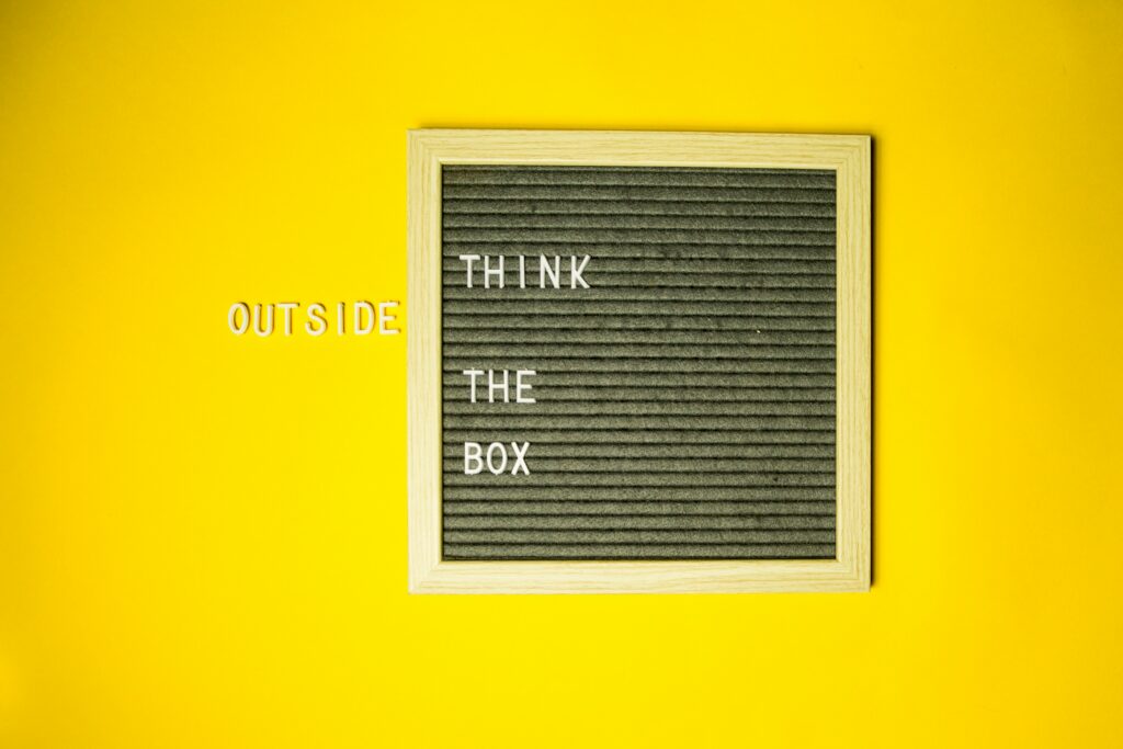 A board reading think outside the box