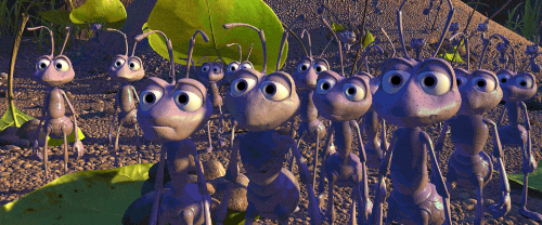 A scene from "The Bugs Life" where the ants all stand next to one another.