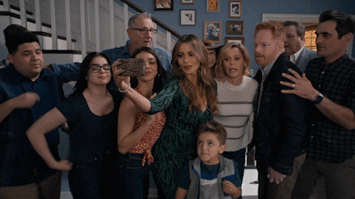 A family taking a group photo